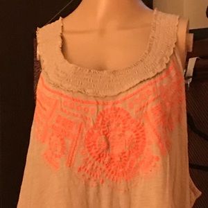 A tunic top with an Aztec type print size 3X